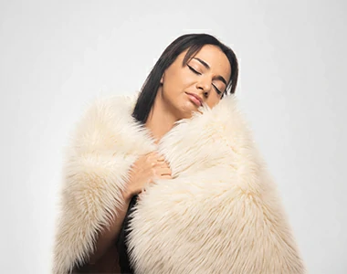 portrait-young-woman-posing-with-fur-coat-white-before